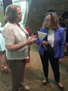 AACF Education Policy Director Jerri Derlikowski (left) chats with Dr. Lombardi at the Little Rock event.